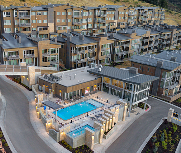 Exterior drone view of the Apex Residences