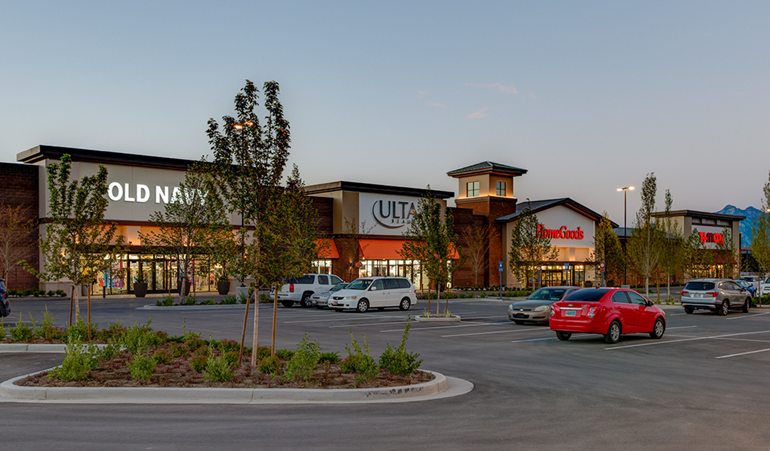 Exterior parking lot view of stores at Mountain View Village