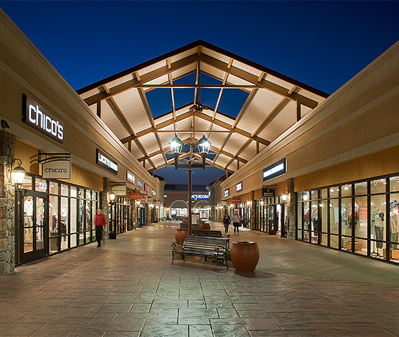 Exterior view of multiple shops at the Outlets at Tejon Ranch