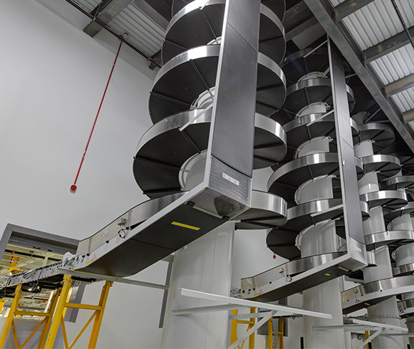 Spiral conveyor belts in the interior of the Automated Fulfillment center