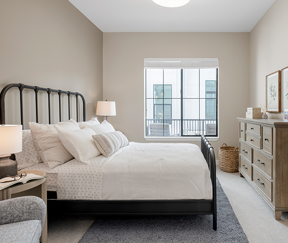 Interior view of bedroom inside the American Groves Senior Living Center