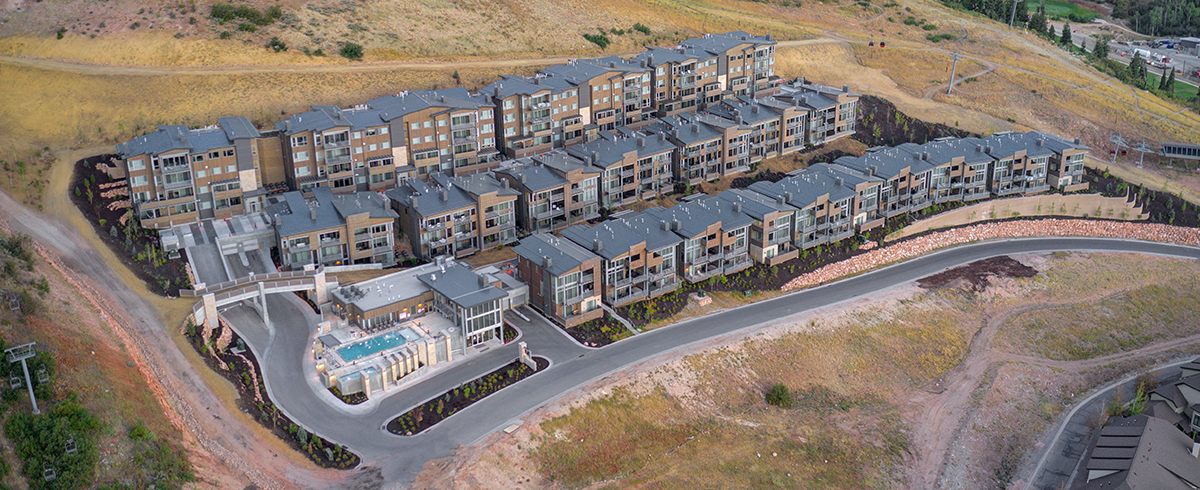 Wide exterior drone angle of the Apex Residences