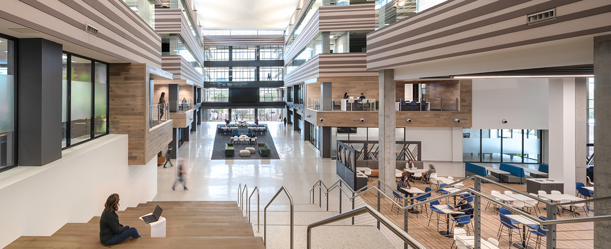 Interior view of lobby and workspaces at Cavasson East