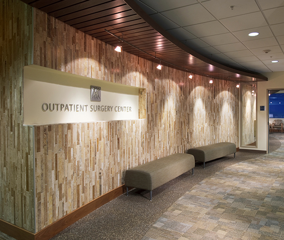 A feature wall with an Outpatient Surgery Center sign