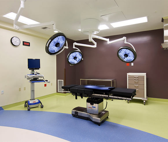 A medical room with a patient bed.