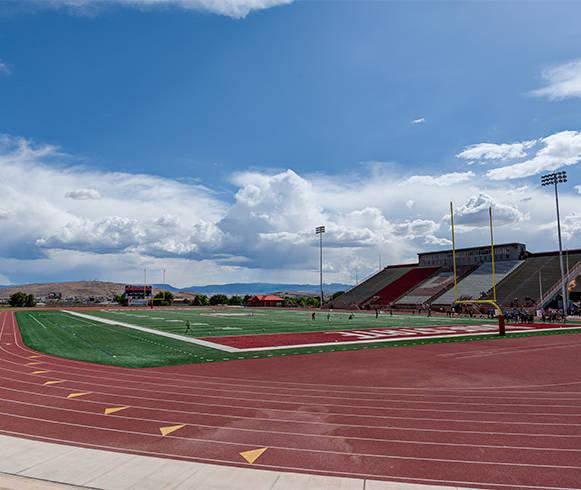 Exterior view of football field from track side at Greater Zion Stadium at Utah Tech University