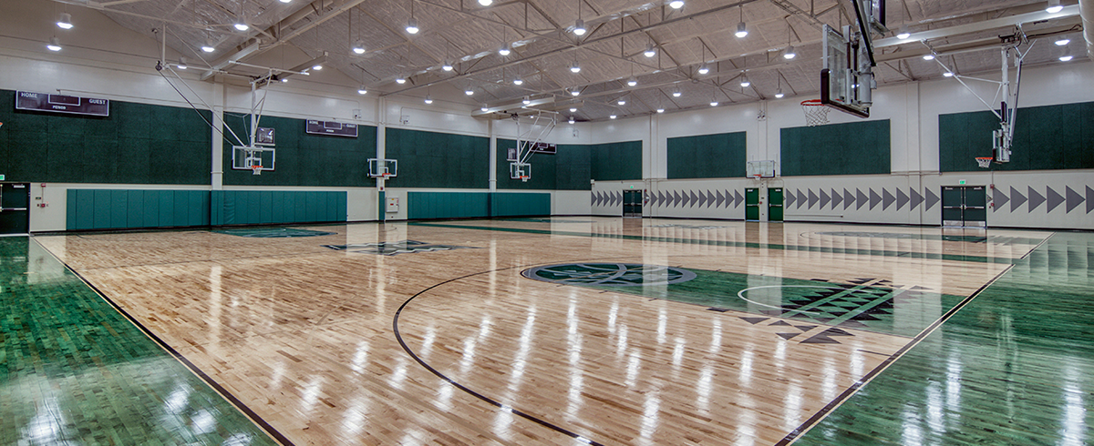 View of two basketball courts at the Gymnasiums at University of Hawaii, Manoa