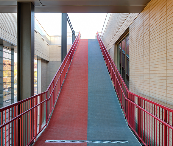 Interior view of wheelchair accessible ramp in the Human Performance Center Utah Tech University