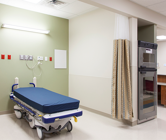 Interior view of hospital bed inside the Lone Peak Hospital Specialty Center
