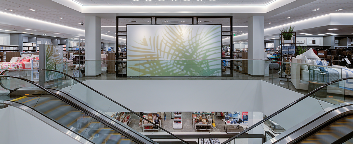 Interior view of escalators at the Macy's at Manhattan Village