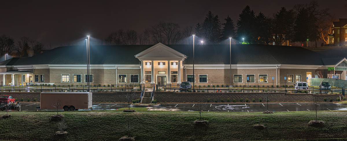 Wide angle exterior view of the Mount Regis Center