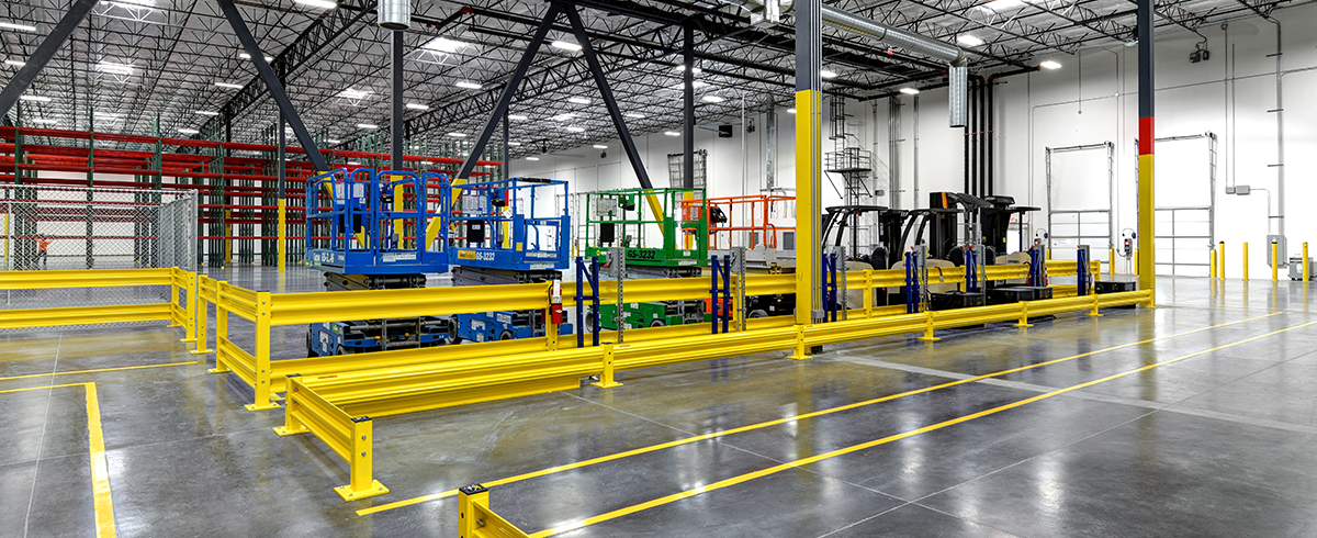 Interior view of Penske Warehouse TI and Cold Storage scissor and fork lifts