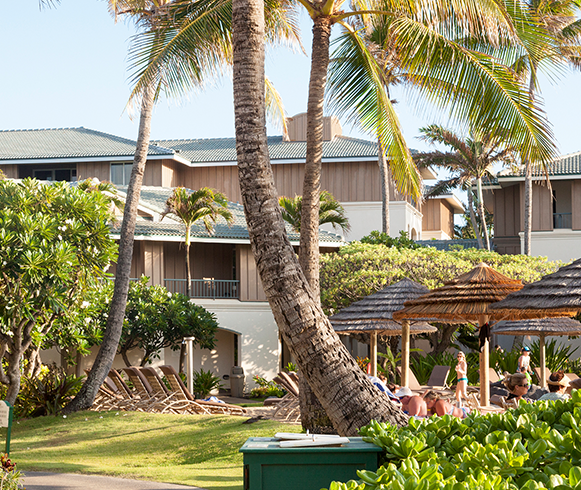 Exterior view of palm trees and greenspaces at The Point at Po'ipu