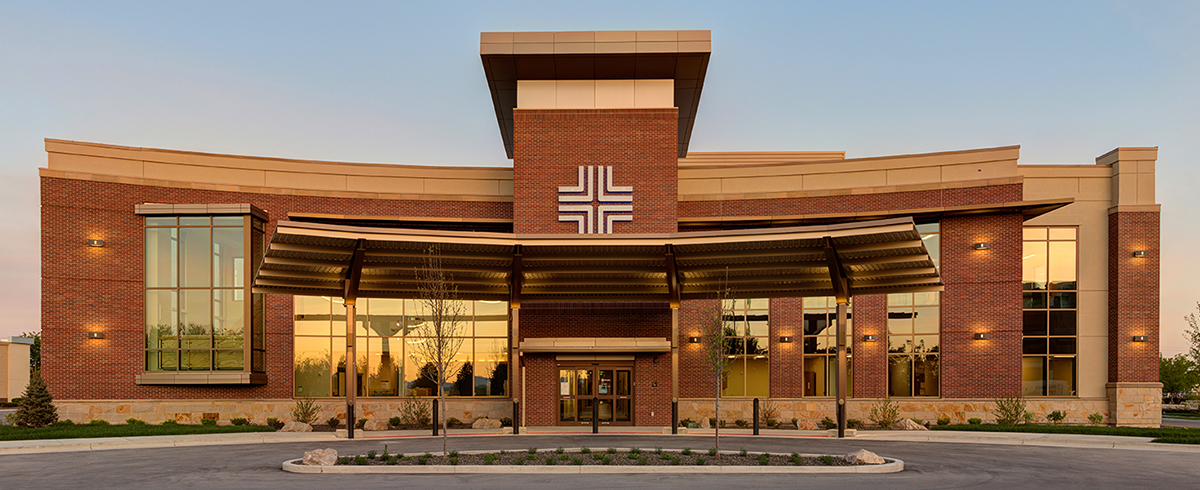 Wide angle exterior view of the entrance to St. Luke's Mountain State Tumor Institute