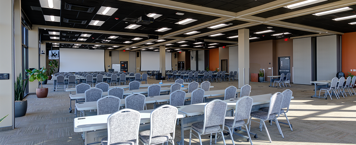 Conference space with tables and chairs at Ultradent office