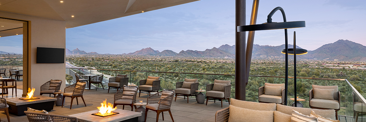 Exterior view of a lounge area with balcony at Hilton North Scottsdale at Cavasson