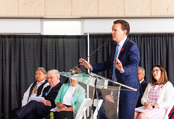 View of a man giving a speech at the Huntsman Cancer Institute