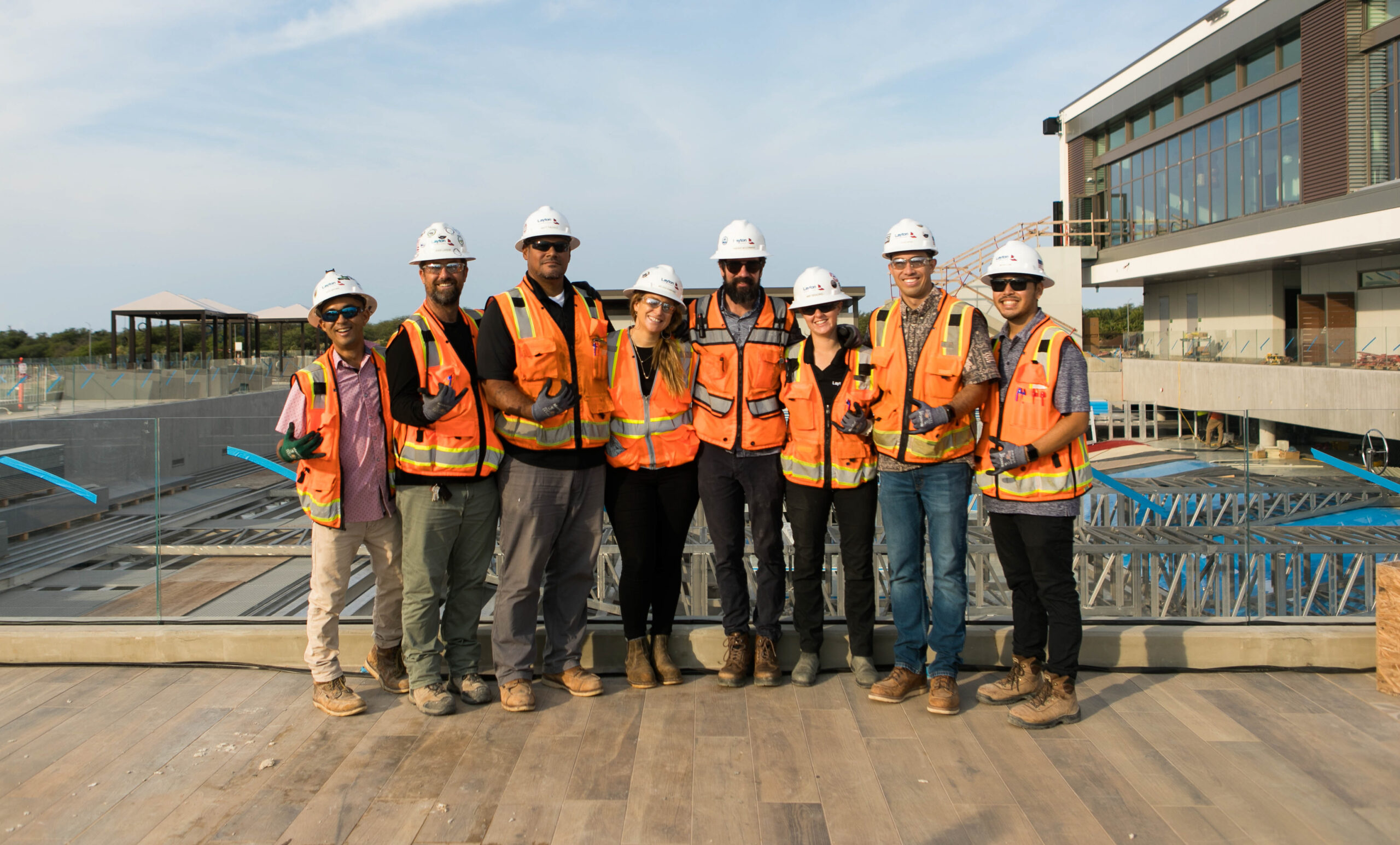 Eight of Layton's LCH Group in Wai Kai wearing full PPE on the jobsite.