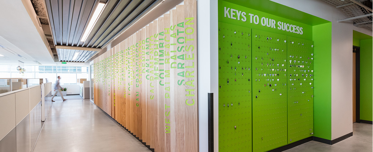 A wood accent walk with a list of cities where Extra Space Storage has locations.