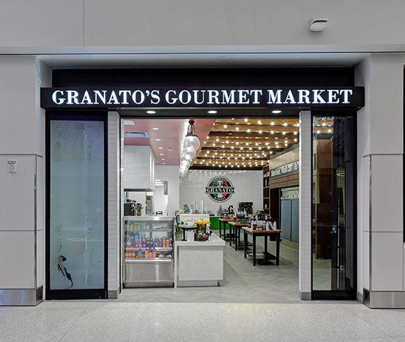 An outside looking in shot of Granato's Gourmet Market at Salt Lake International Airport.