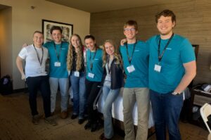 Hope Stauffer with group of students during ASC competition.