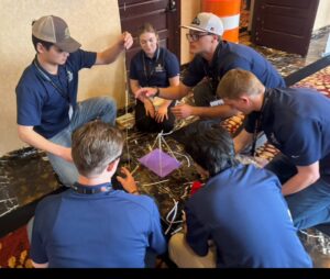 Students during ASC competition working together on a solution.