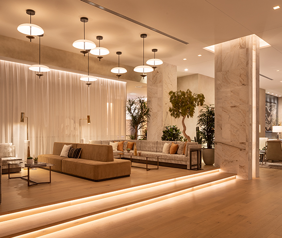 Interior photo of Caesars Republic hotel showing the waiting area near the check in desk.