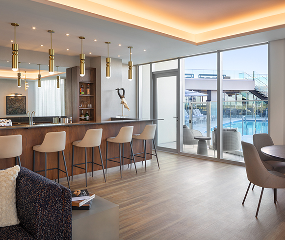 Interior photo of Caesars Republic hotel showing the bar near the pool deck.
