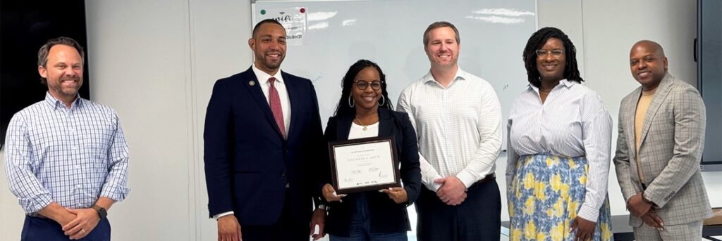 From left to right: Layton VP Jay Adams, County Commissioner Tommy Calvert, TPEP graduate Sherrika Arch, Layton CM Steve Knowles, UH Director of Diversity Latifah Jackson, and Layton Trade Partner & Supplier Diversity Manager Raymour Clarke