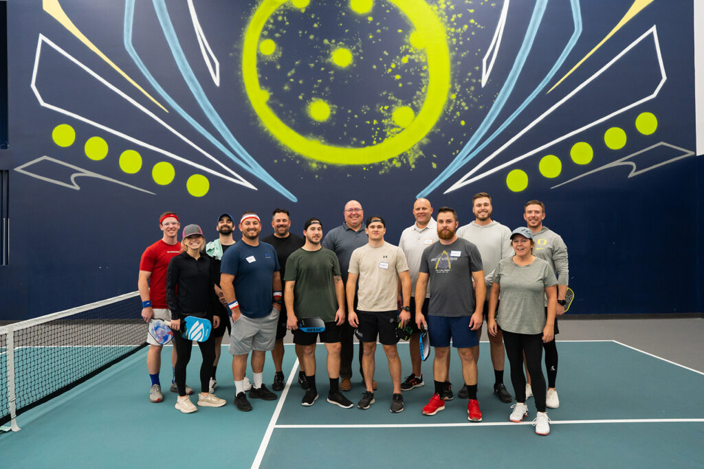Photo of people playing pickle ball during a Layton tournament