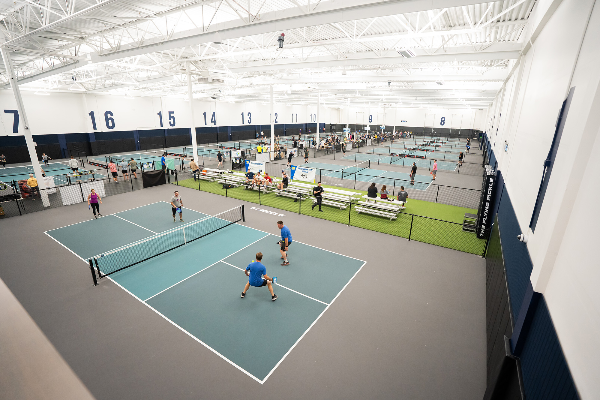 Photo of people playing pickle ball during a Layton tournament