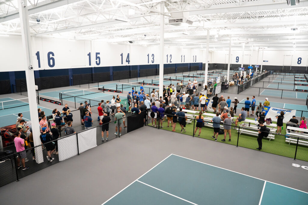 Photo of people playing pickle ball during a Layton tournament