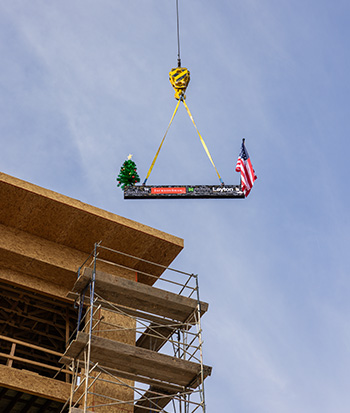 Raising the signed beam at Westin at Noterra Topping Out in Phoenix