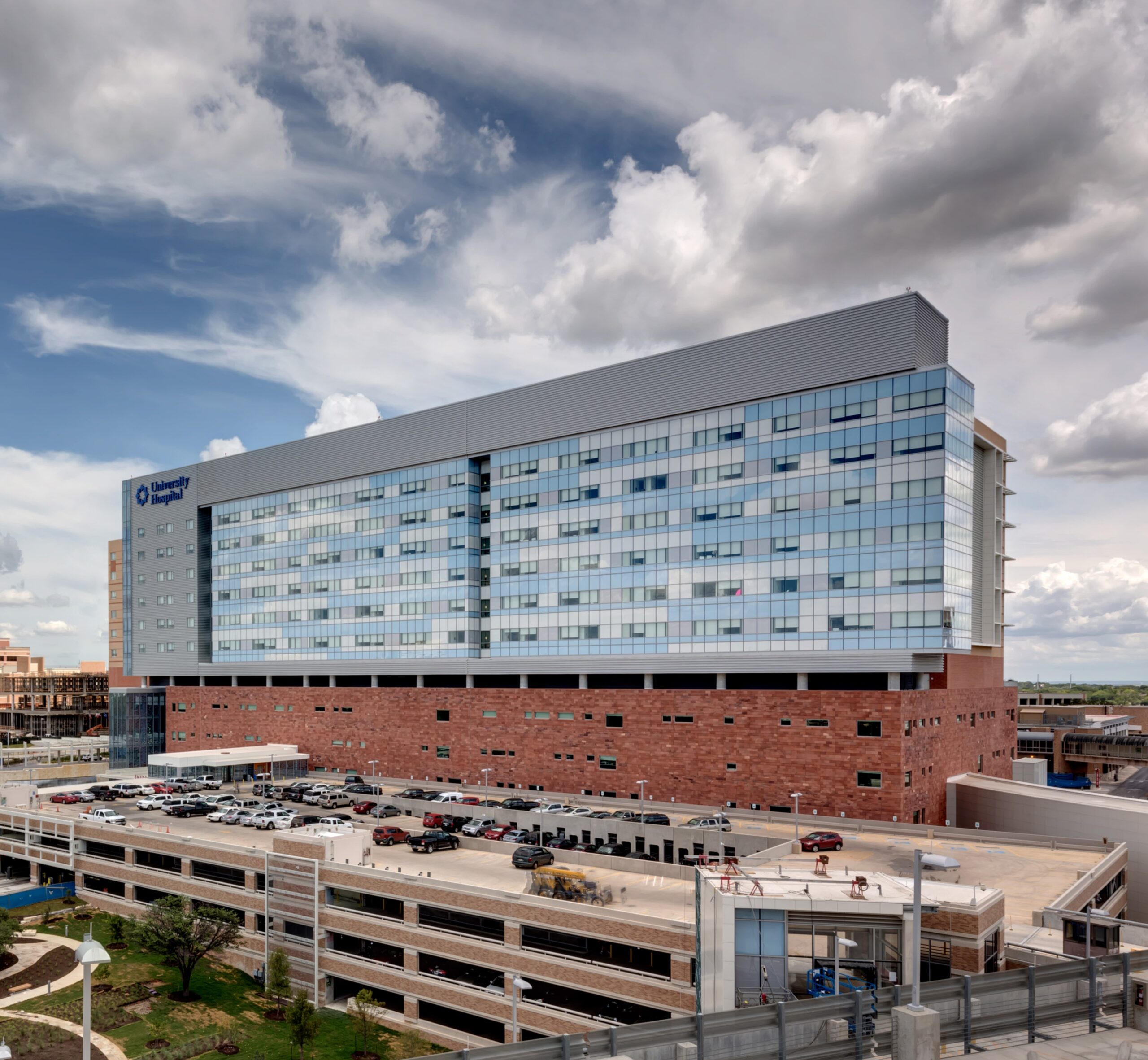 Freestanding, 12 story hospital with exterior windows and brick