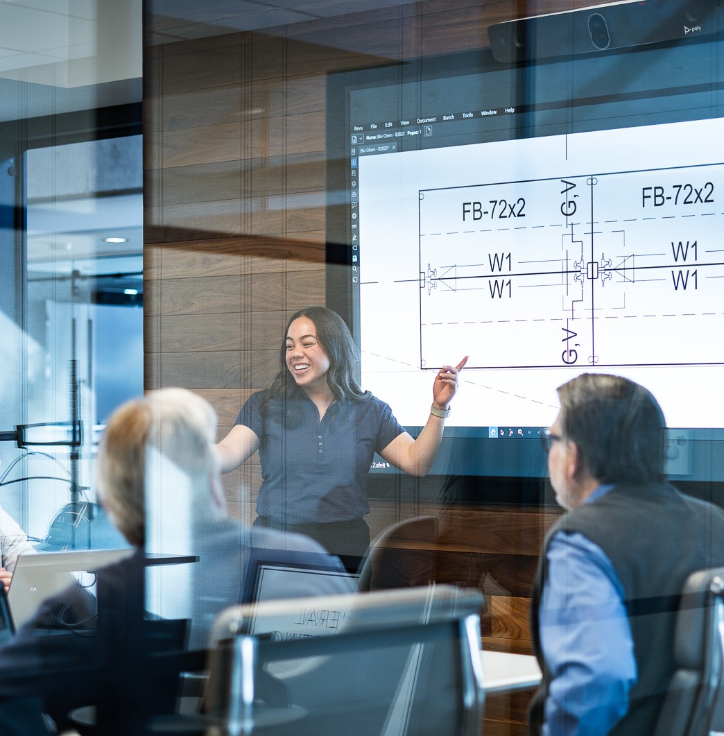 A female estimator giving a presentation